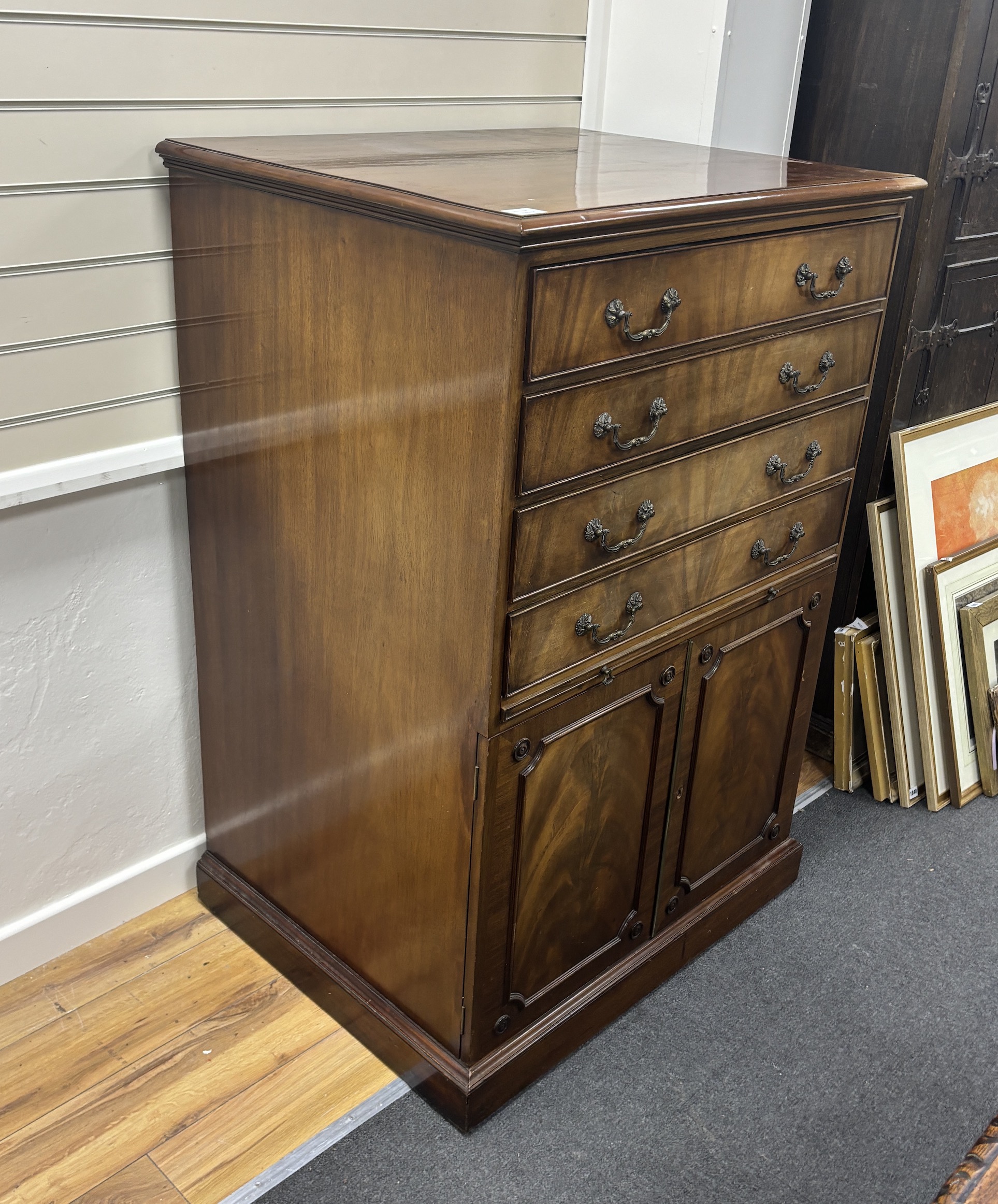 A George III style mahogany architects or draughtsman's chest, fitted with four drop front drawers, width 87cm, depth 70cm, height 131cm